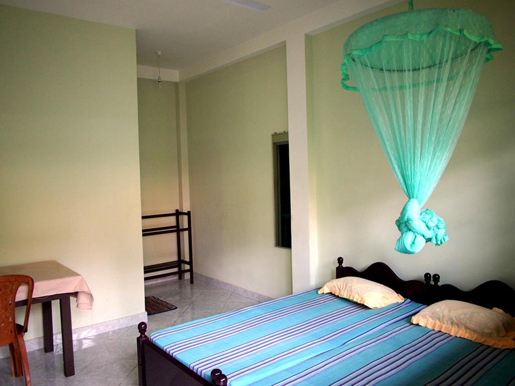 Hotel Amila Guest à Trincomalee Chambre photo